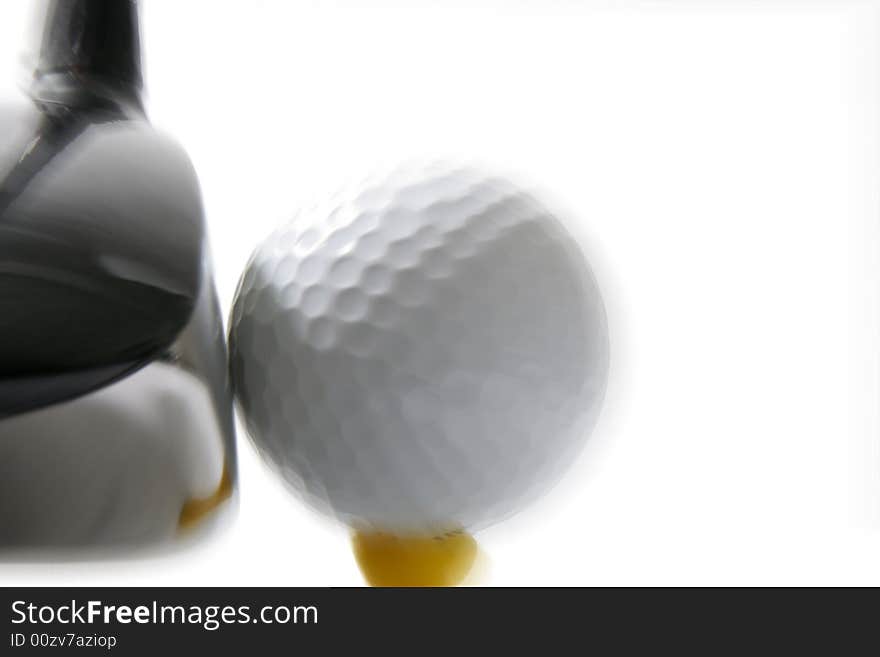 Game of Golf - Golf ball on a tee with golf club (driver). Game of Golf - Golf ball on a tee with golf club (driver)