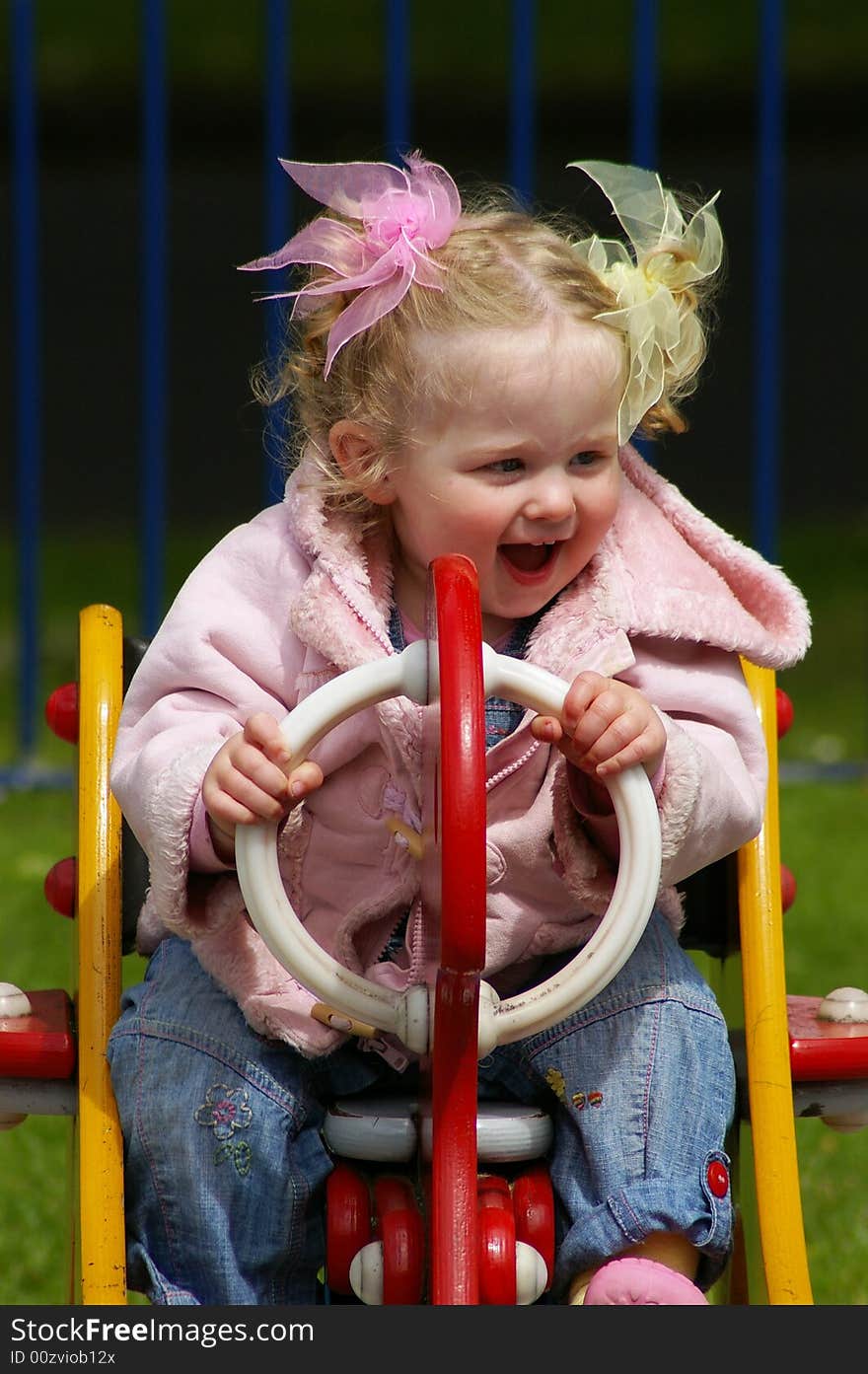 Happy girl playing in park