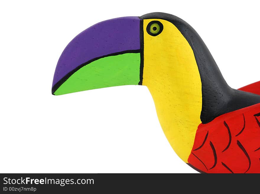 Isolated Brightly colored handcarved wooden toucan