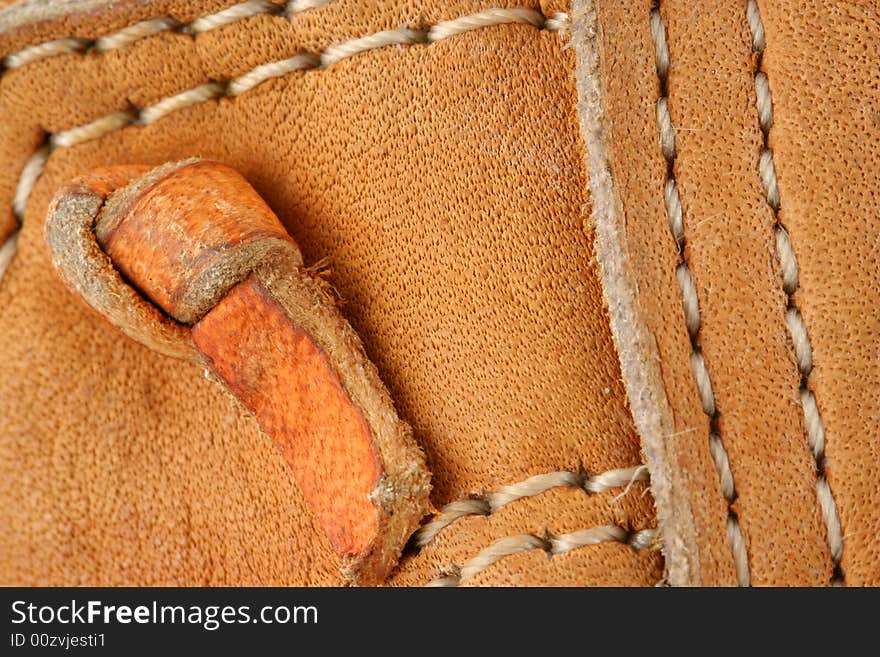 Leather baseball glove macro background