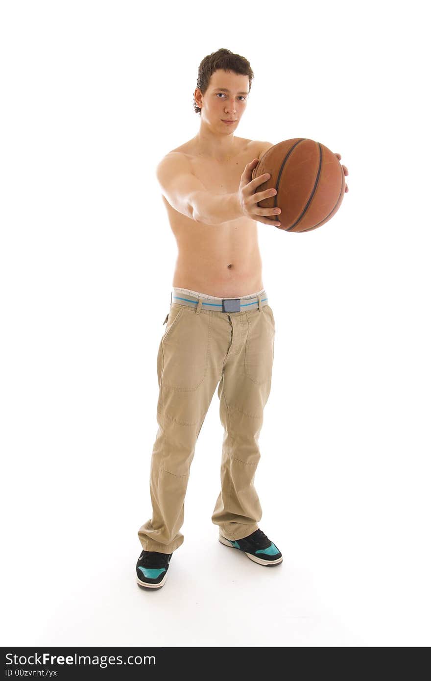 The young basketball player isolated on a white background