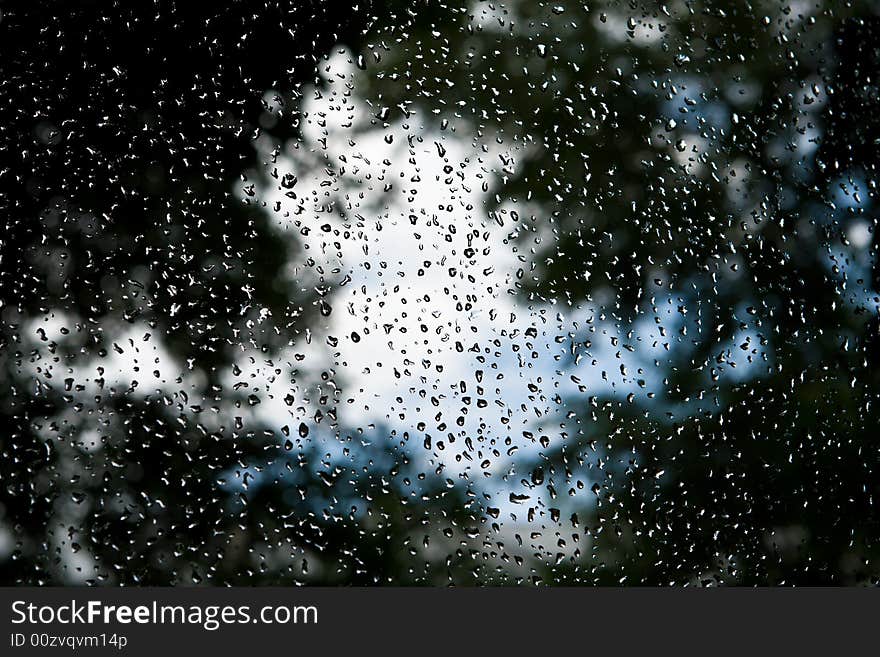 Drops of a rain on a window pane. Drops of a rain on a window pane