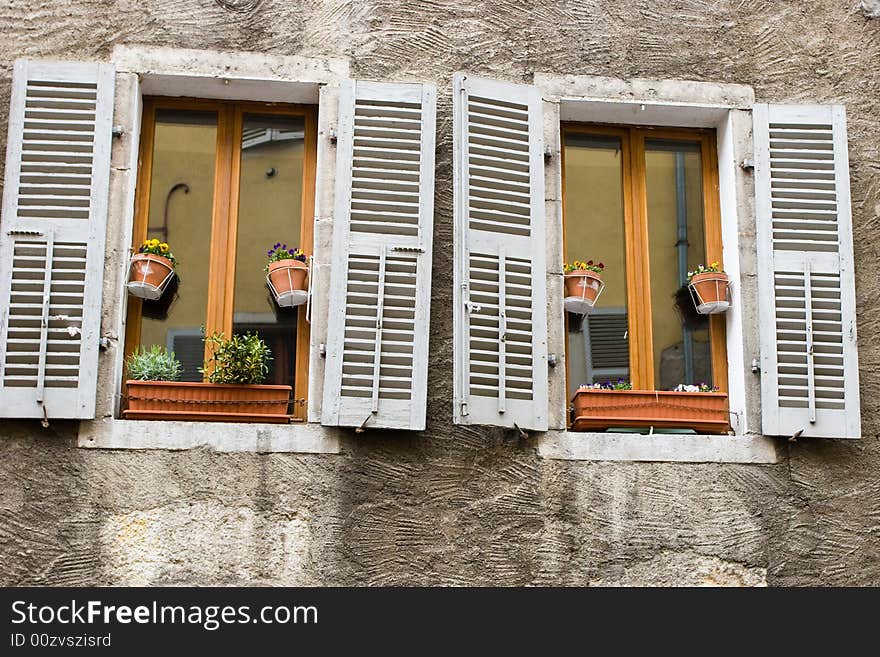 Shuttered windows at medieval town of Annecy, France