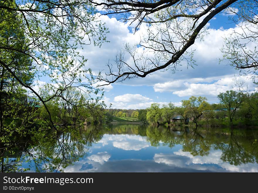 Clouds over pond