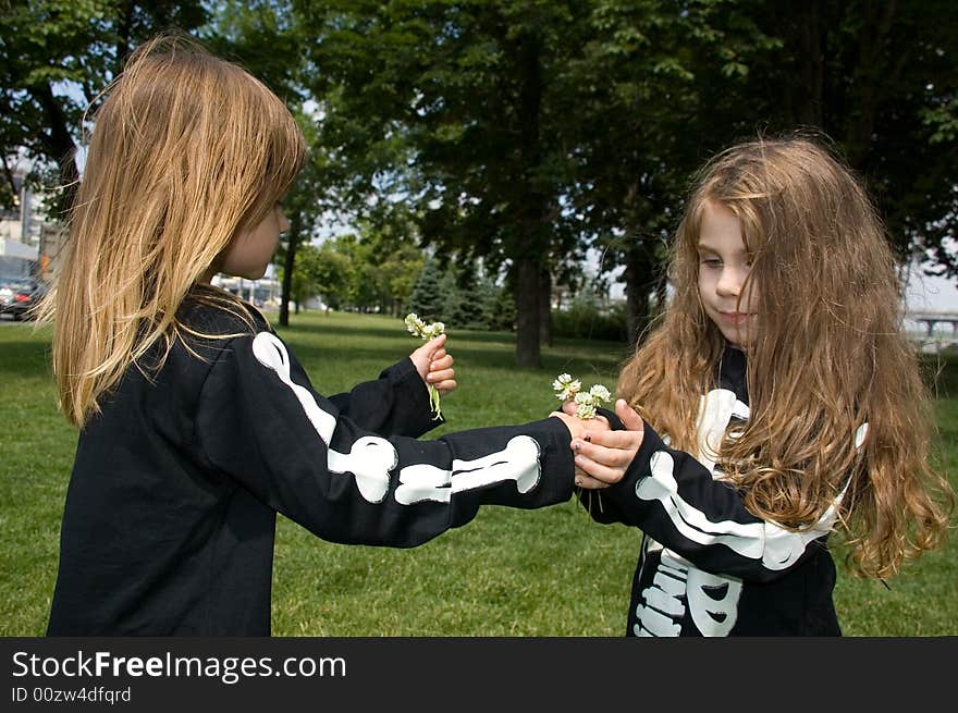 Little girls dressed as a sketeton makie faces. Little girls dressed as a sketeton makie faces