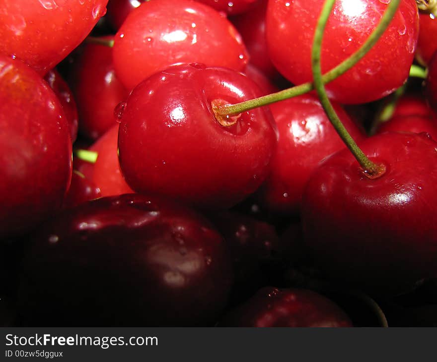 Closeup of cherries lying in a pile. Closeup of cherries lying in a pile