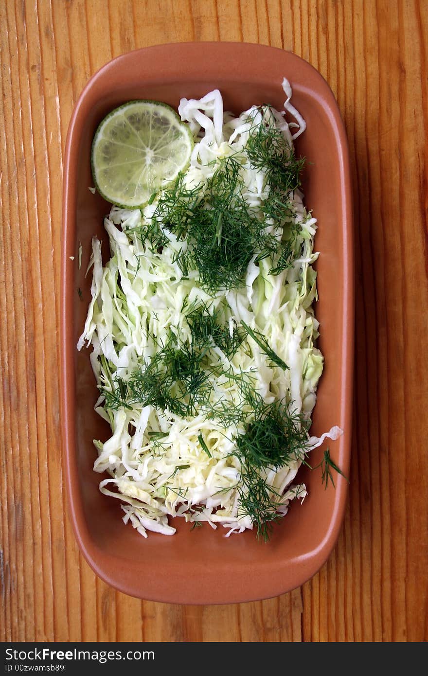 Salad from cabbage with fennel, lime and an olive oil