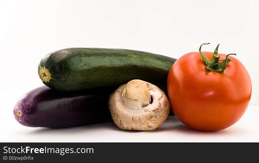 An arrangement of summer produce isolated on white. An arrangement of summer produce isolated on white.