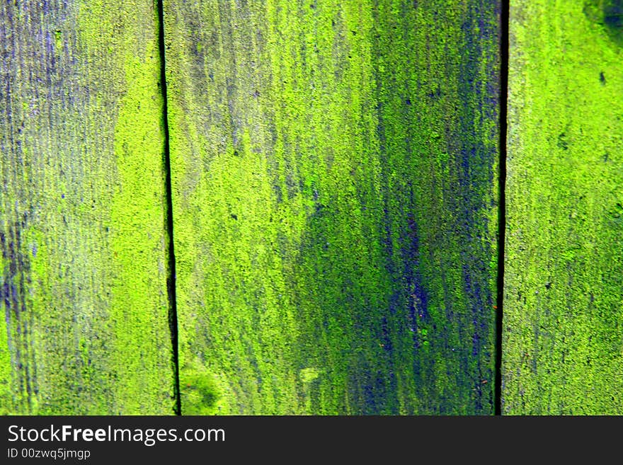 Wooden old stained country fence. Wooden old stained country fence