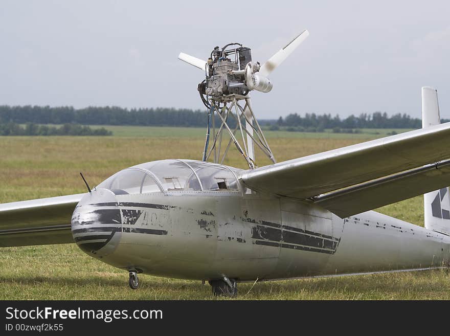 Motoglider at the runway in the field Pachomovo. Motoglider at the runway in the field Pachomovo