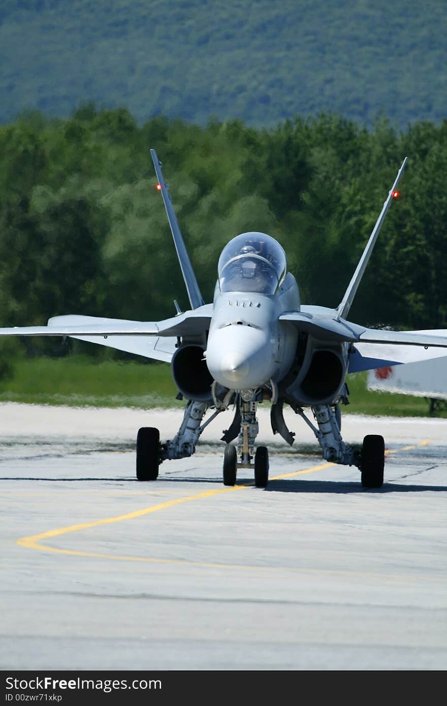 F18 hornet taxiing at air show in Quebec. F18 hornet taxiing at air show in Quebec