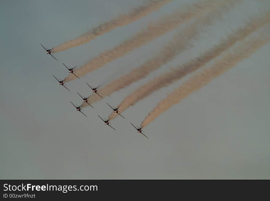 Red arrows formation fly at air show in Quebec. Red arrows formation fly at air show in Quebec