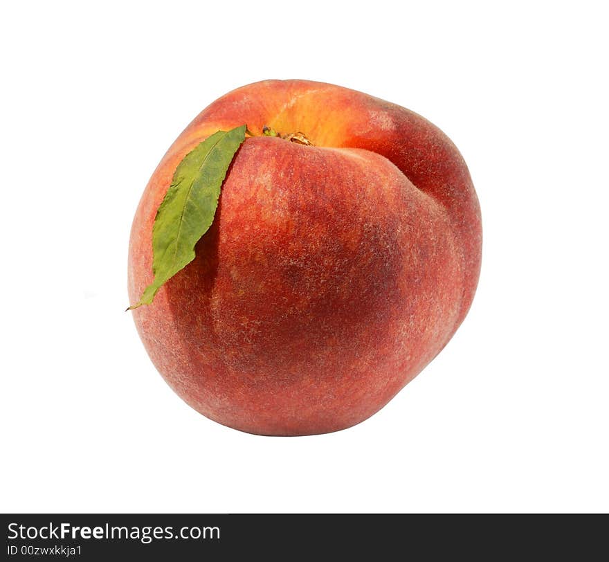 Ripe peach with leaf isolated on white background