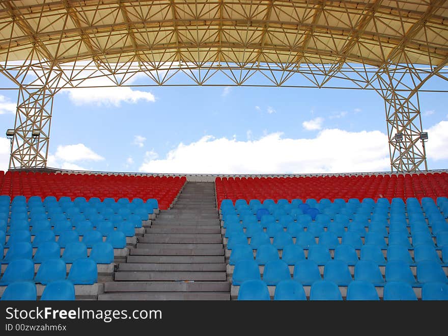 Empty Stadium seats perspective and roof