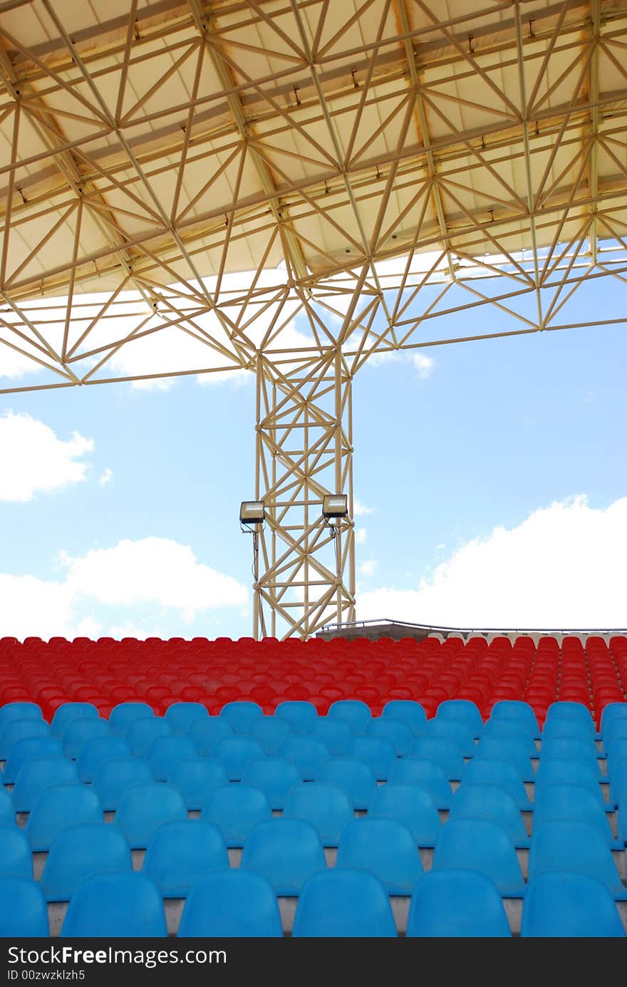 Empty Stadium seats perspective and roof