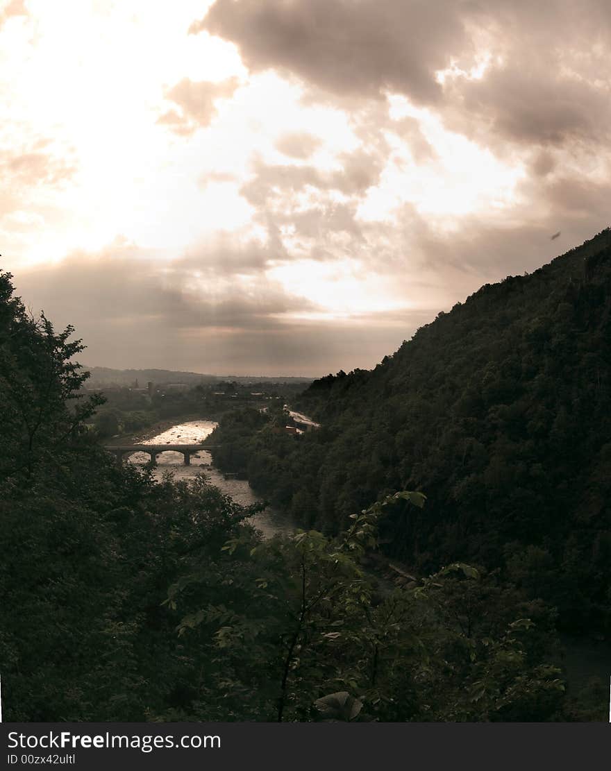 The Sun gets back after a bad storm on the river Stura. The Sun gets back after a bad storm on the river Stura