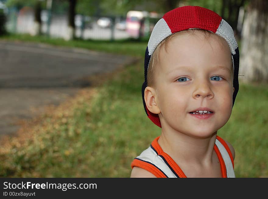 4 year old pretty boy wearing a cap. 4 year old pretty boy wearing a cap