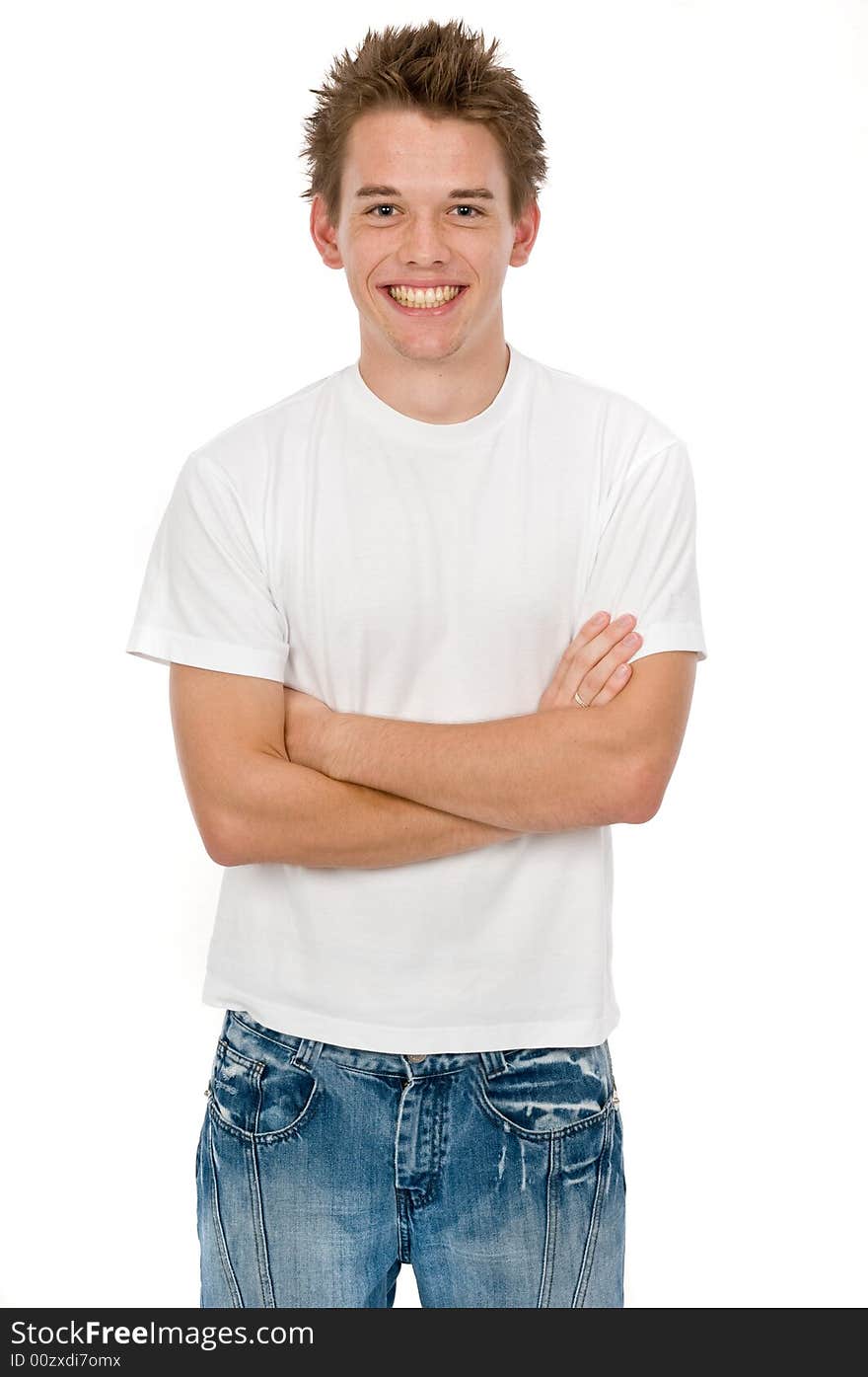 A handsome young man posing in the studio. A handsome young man posing in the studio