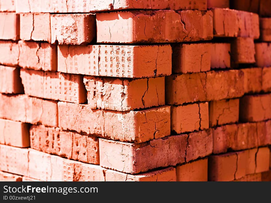 Big heap of red bricks