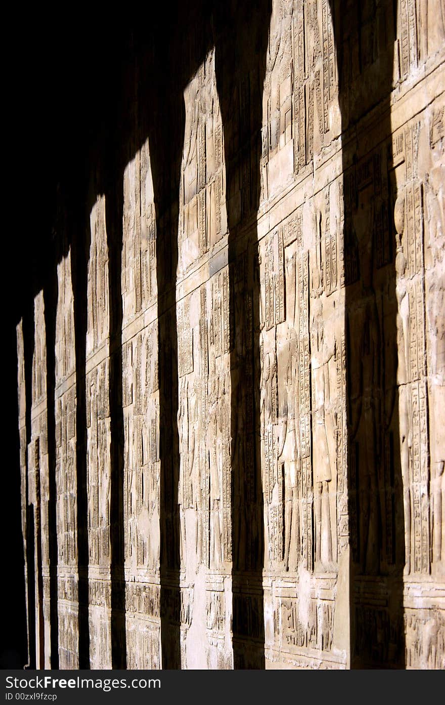 Shadows of ancient pillars, Ptolemy temple on the island of Philae, Egypt