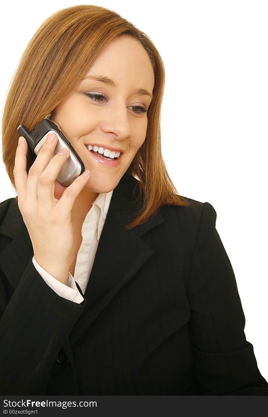 Close up shot of young business woman smile while on the phone. Close up shot of young business woman smile while on the phone