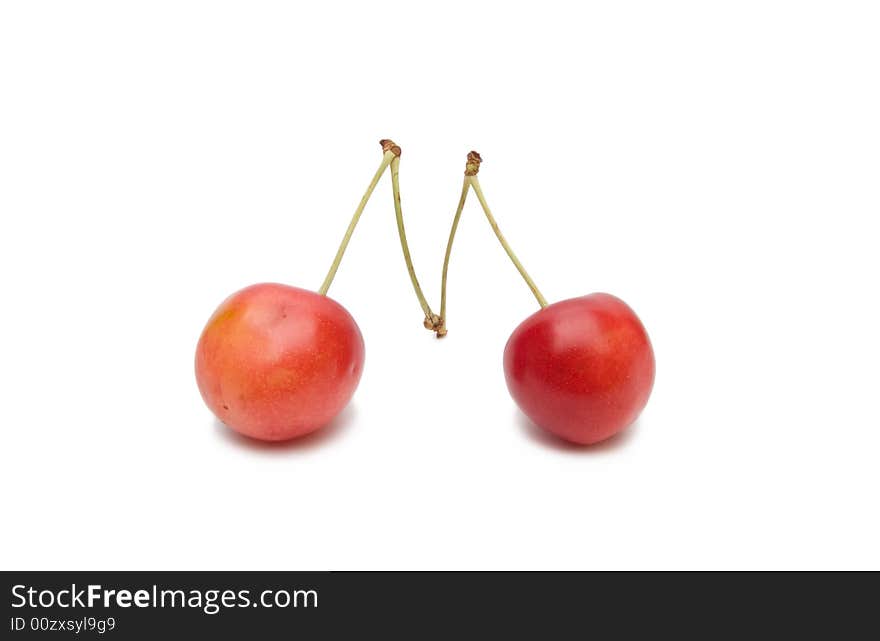 Two cherries isolated on white