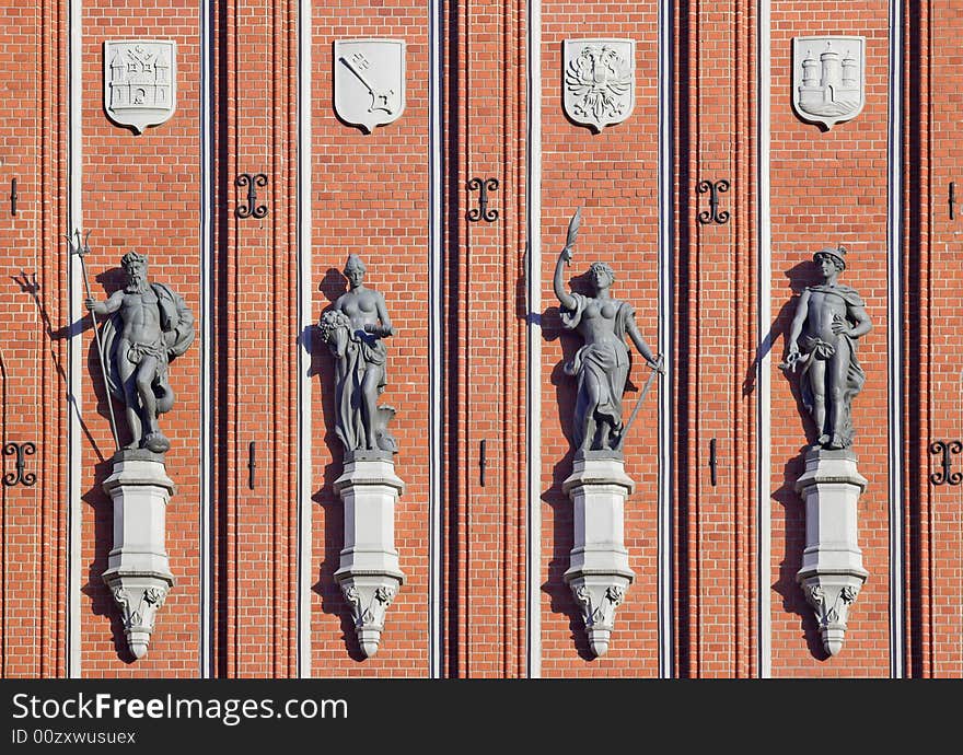 Four sculptures on Blackheads house wall in Riga. Four sculptures on Blackheads house wall in Riga.