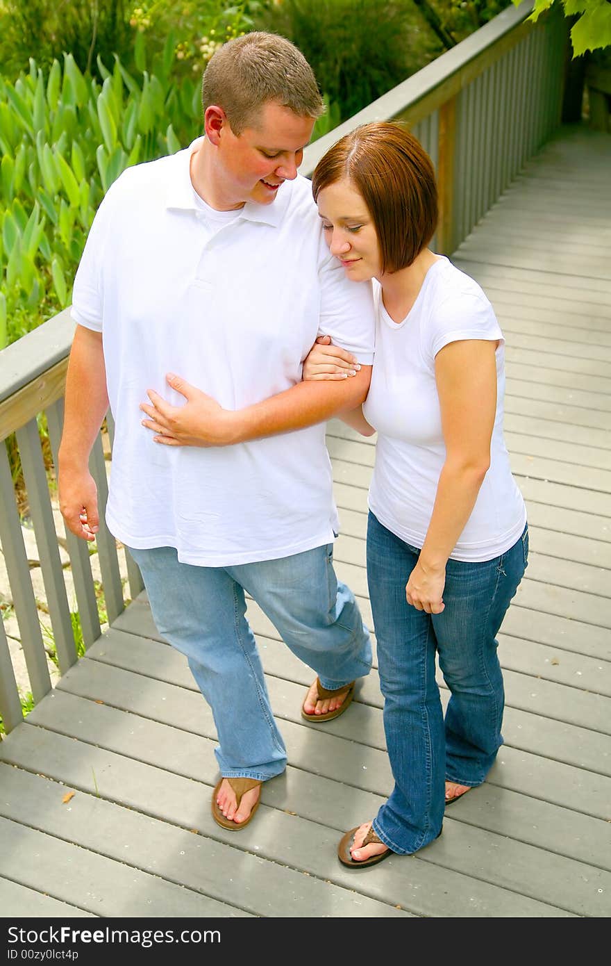 Couple doing evening walk and talking. concept for happiness, love or family. Couple doing evening walk and talking. concept for happiness, love or family