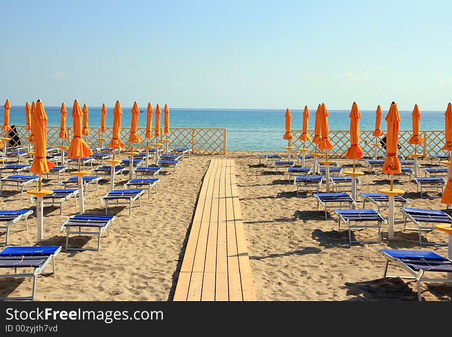 Mediterranean furnished beach area with colorful huts. Palermo (island of Sicily) Italy. Mediterranean furnished beach area with colorful huts. Palermo (island of Sicily) Italy