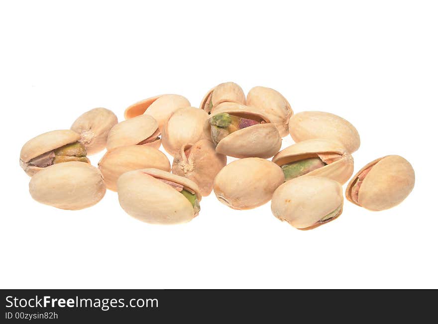 Pistachio nuts isolated on a white background. Pistachio nuts isolated on a white background