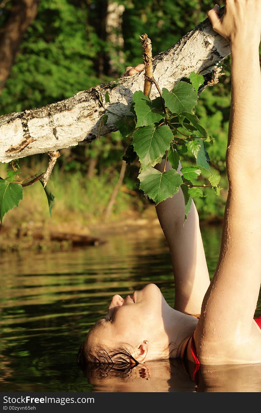 Woman under Tree in Water