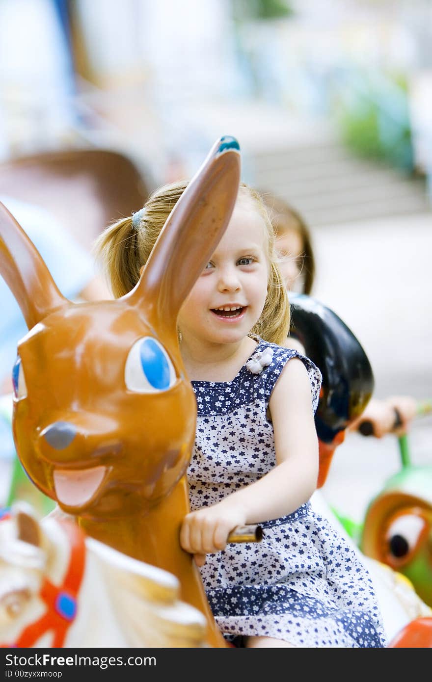 Little cute girl having fun in park