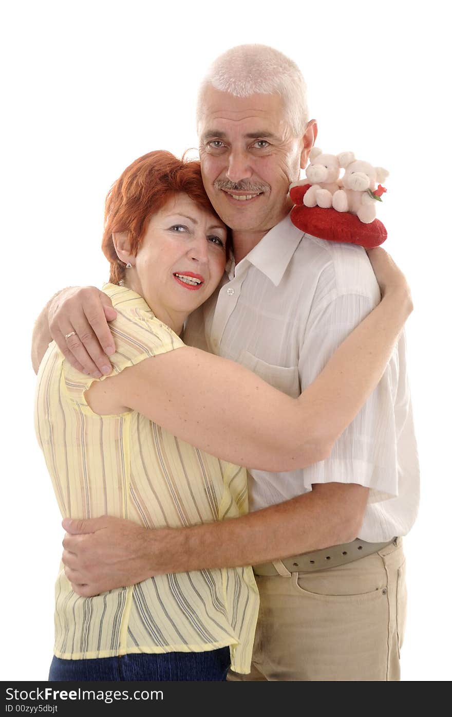 Seniou couple with toy in studio on white background. Seniou couple with toy in studio on white background