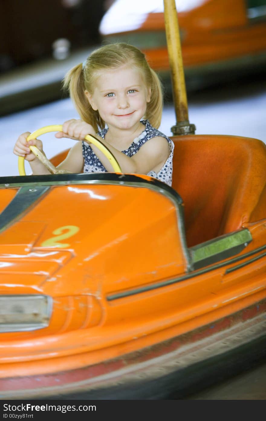 Little cute girl having fun in park