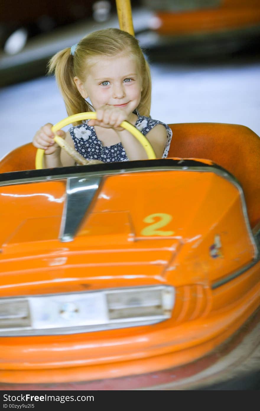 Little cute girl having fun in park