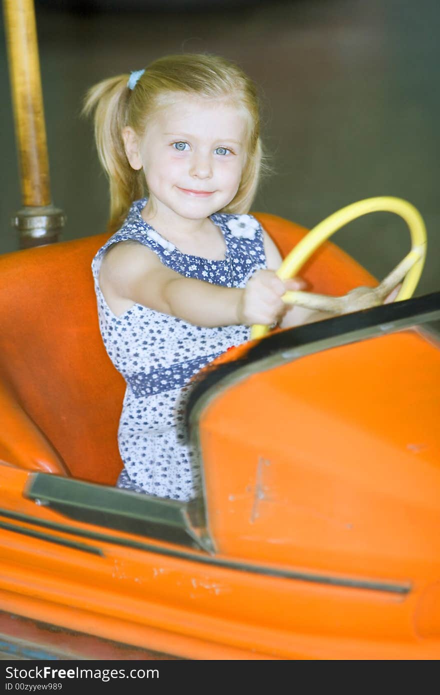 Little cute girl having fun in park