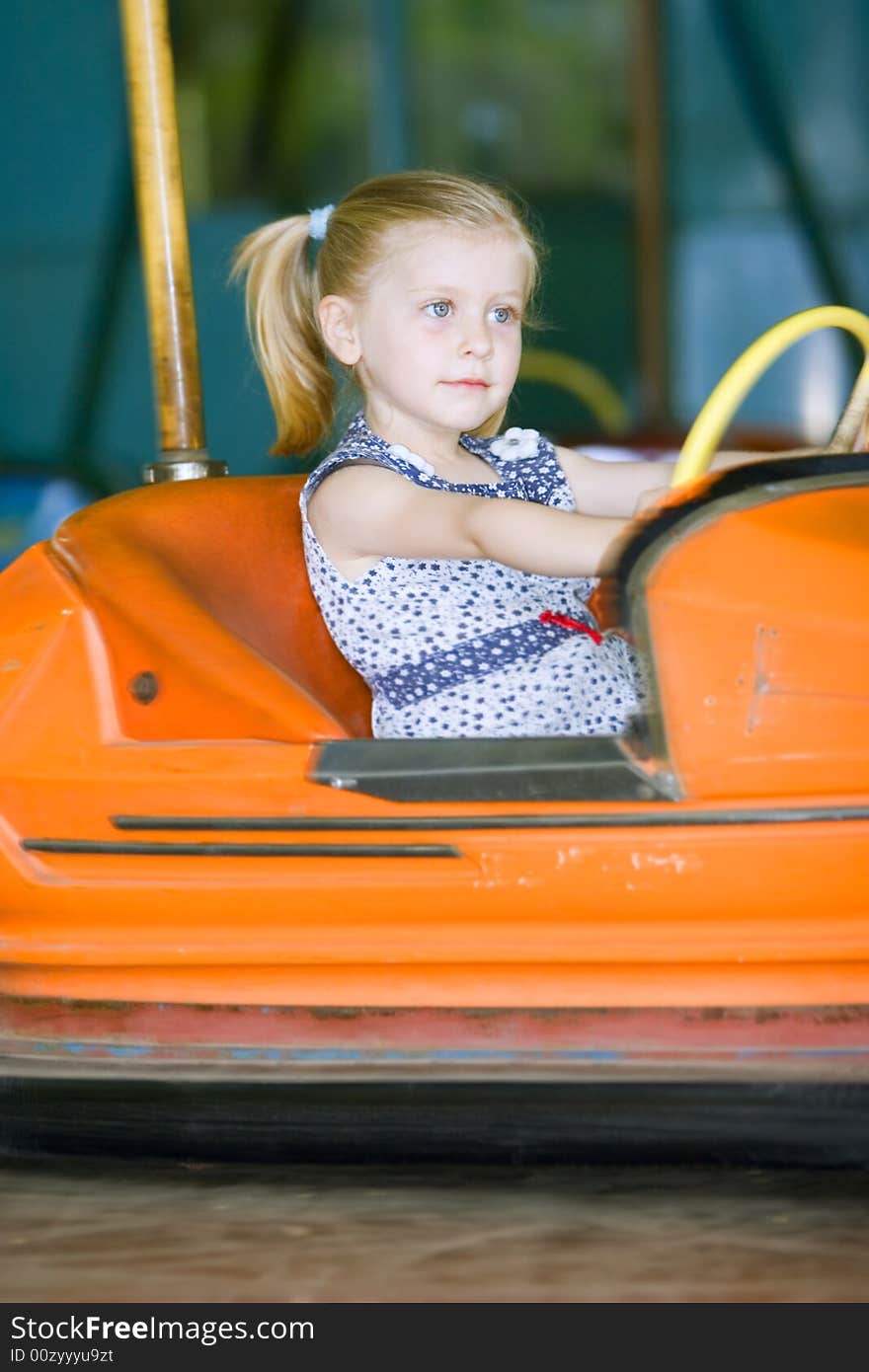 Little cute girl having fun in park