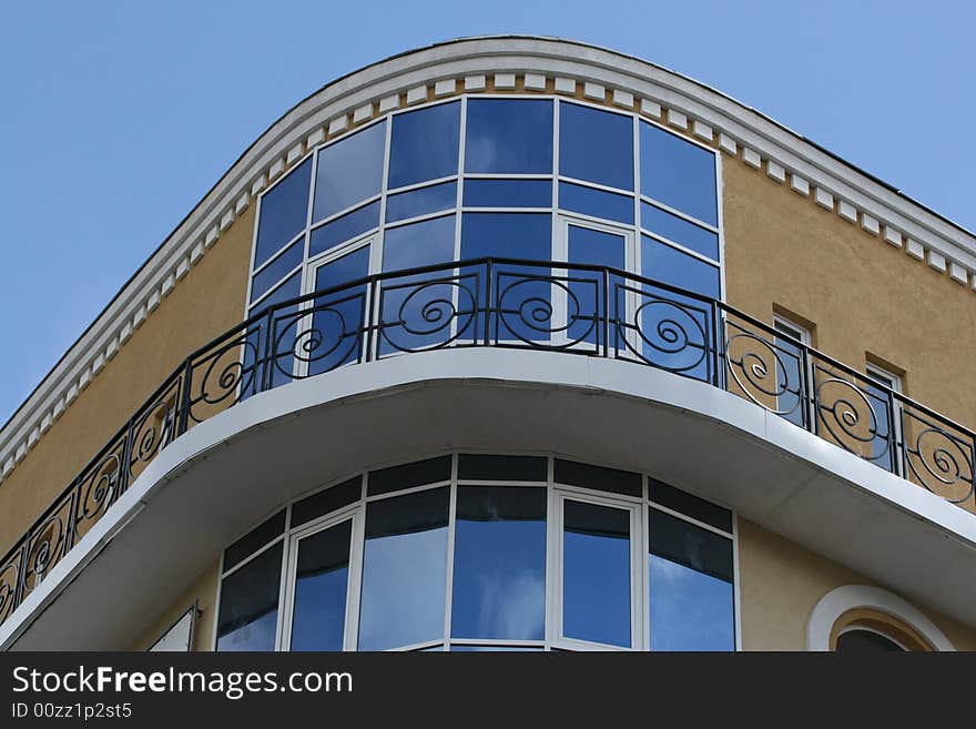 Fragment of modern house on the sky background. Fragment of modern house on the sky background