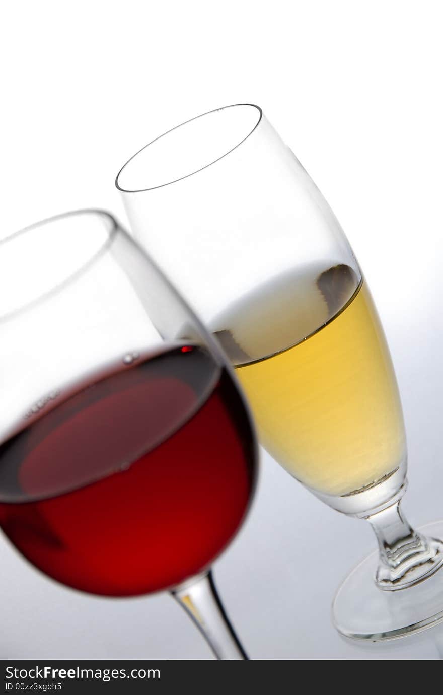 Two glasses of wine on white background