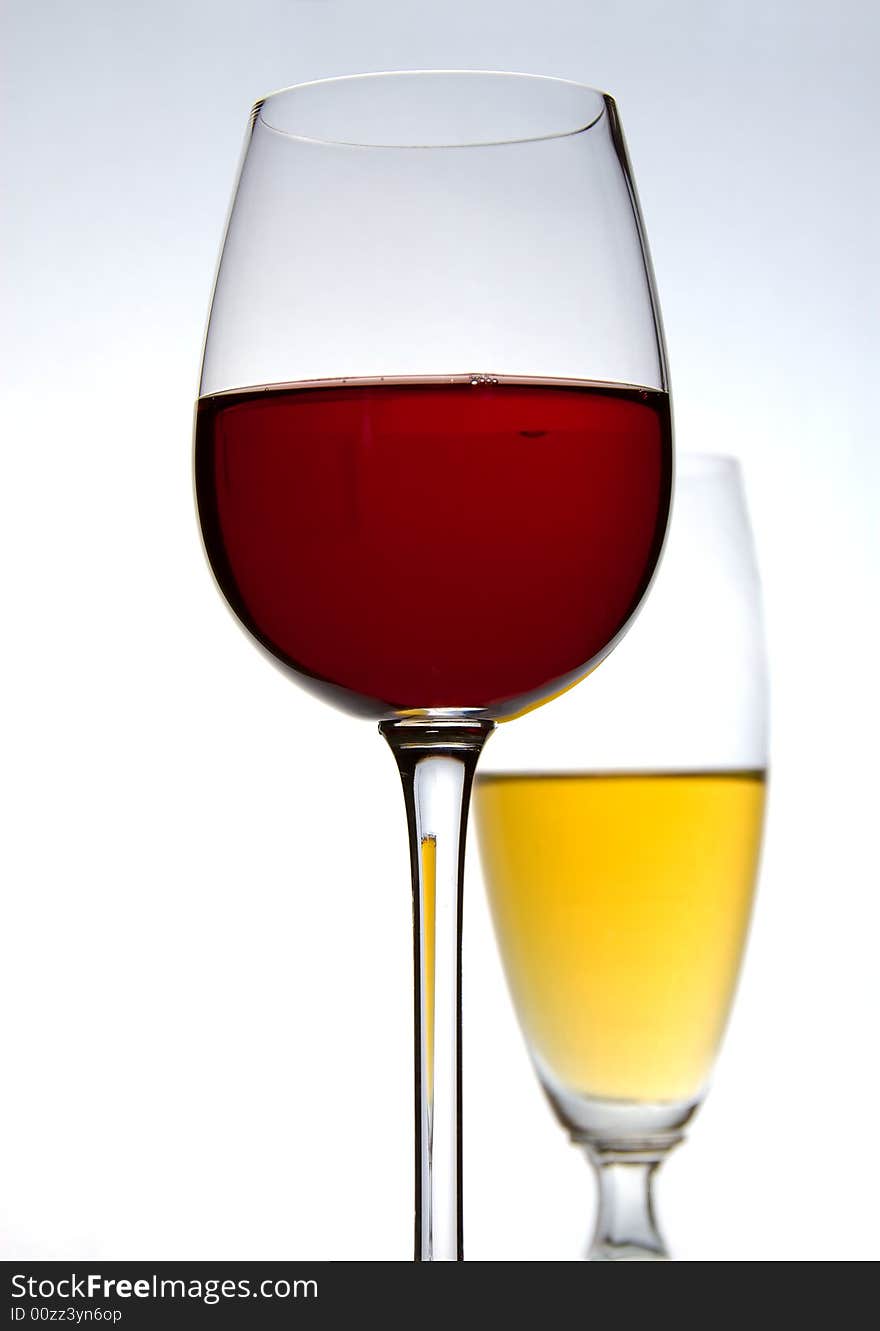 Two glasses of wine on white background