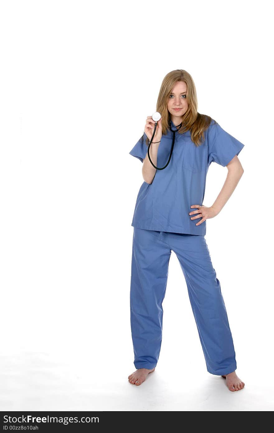 Female doctor with stethoscope and her hand on hip