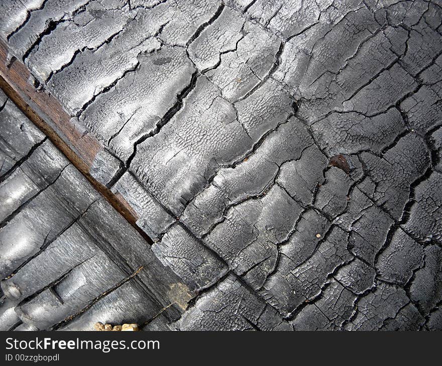 A close up photograph of some brunt tree bark. A close up photograph of some brunt tree bark.