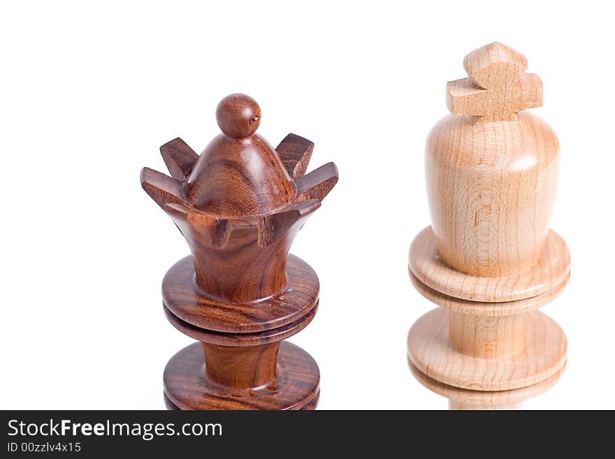 Two chess pieces standing close up view.