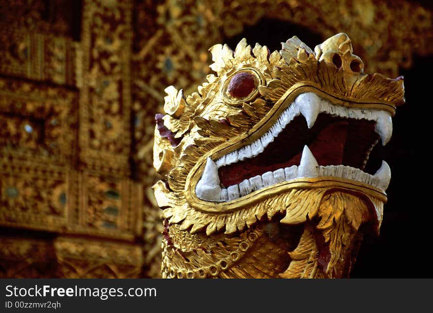 Golden head of dragon in Buddhist temple in Chiang Mai, Thailand