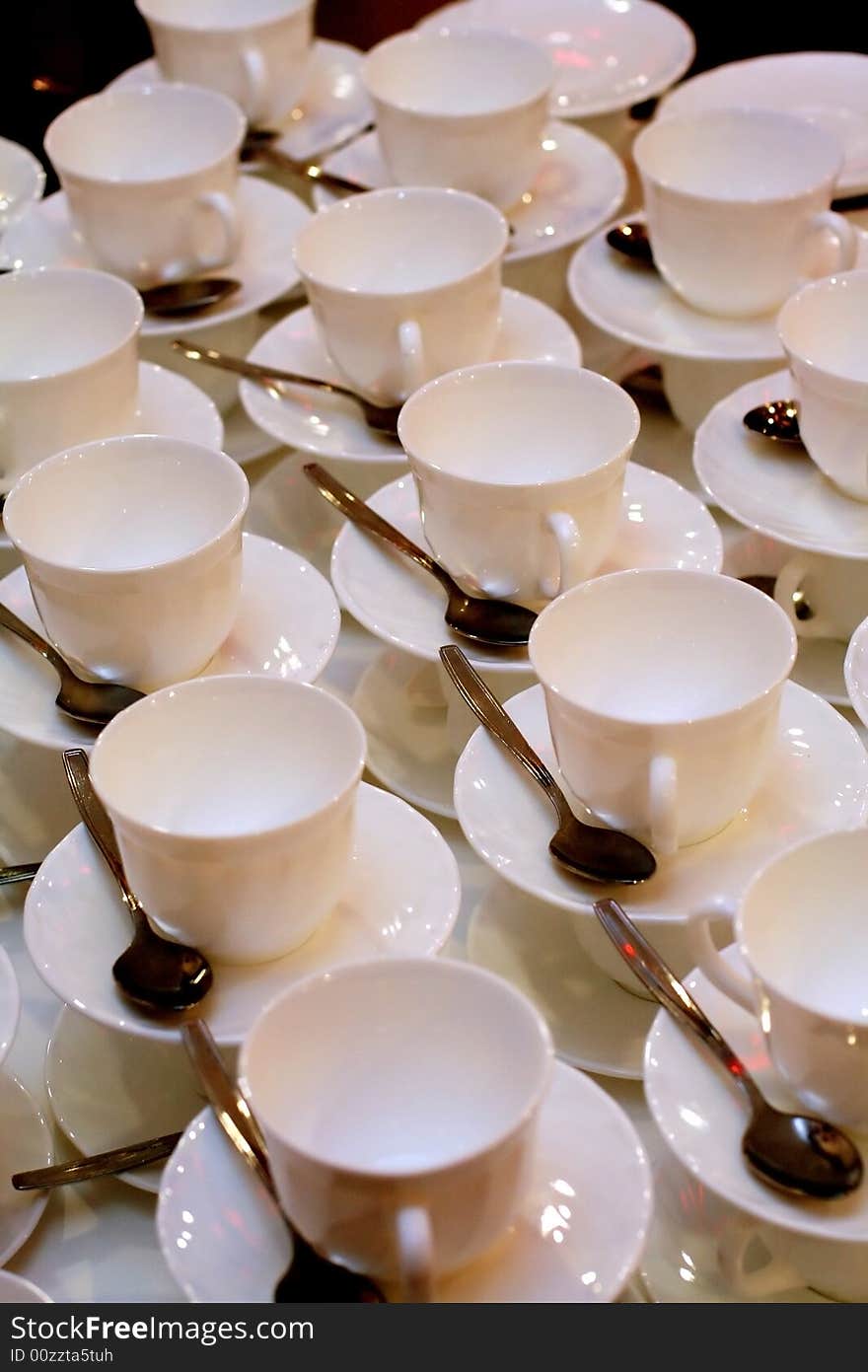 White china cups on a table