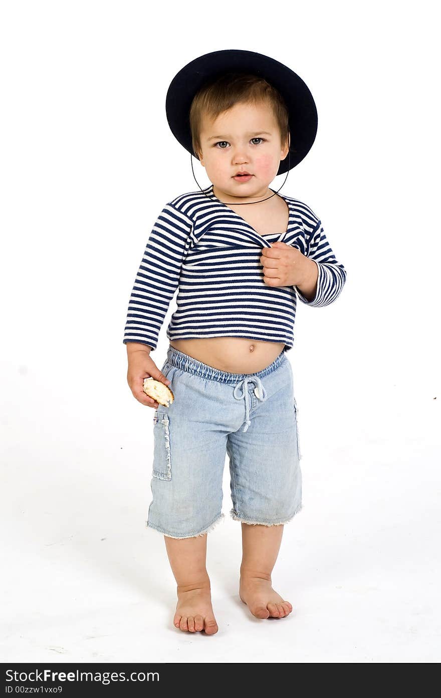 Cute barefoot sailor boy isolated on white