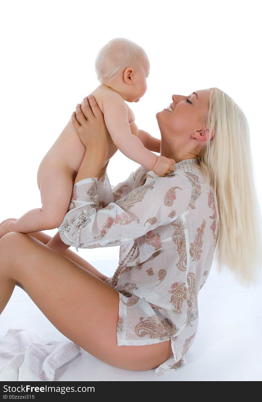 Happy mother with baby over white