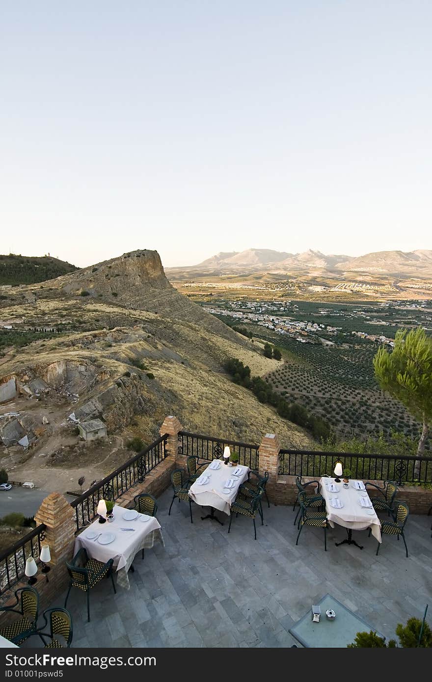 Restaurant balcony with mediterranean background.