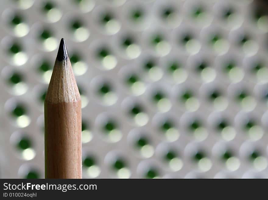 A pencil  with a simple color background. A pencil  with a simple color background