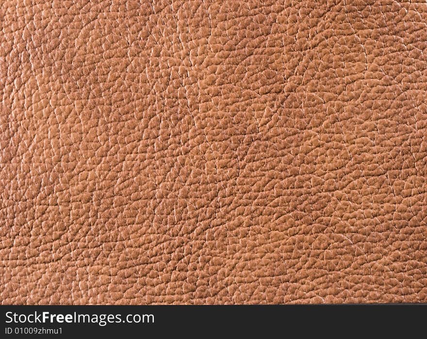 Natural qualitative brown leather texture. Close up. Natural qualitative brown leather texture. Close up.